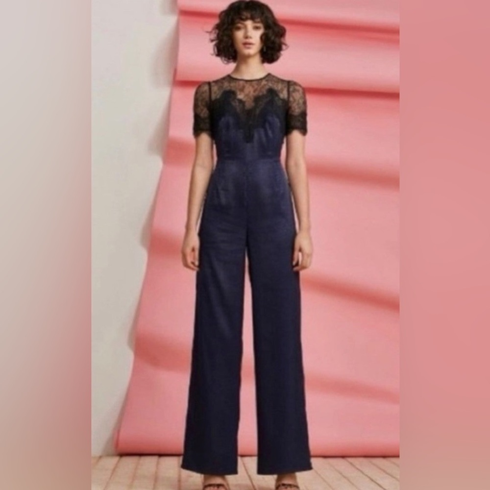 Foxiedox Anthropologie Navy blue jumpsuit with black lace Size XS NWT
